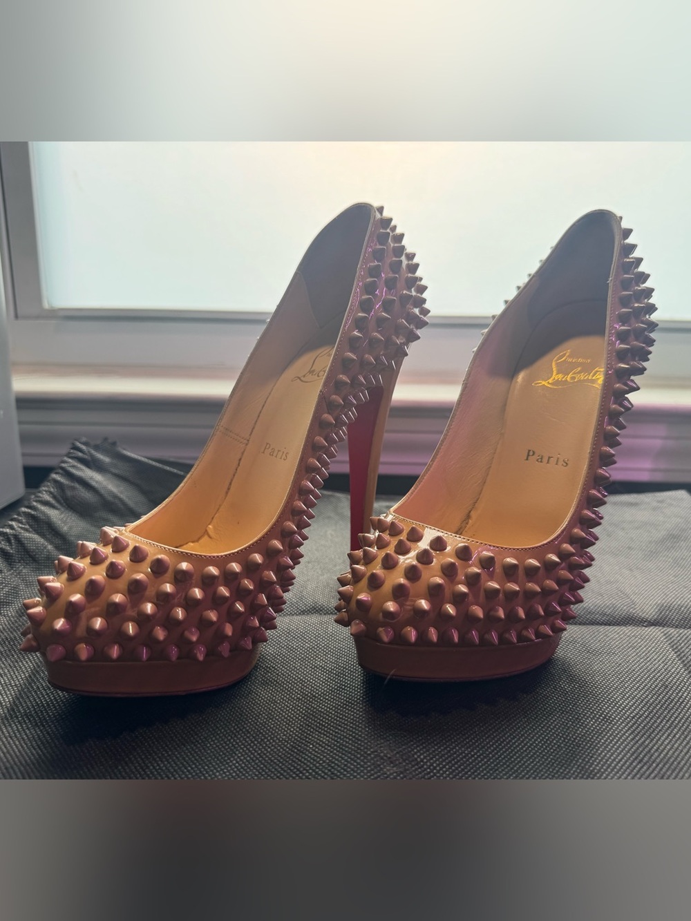 Christian Louboutin Studded Pointed-Toe Pumps in beige